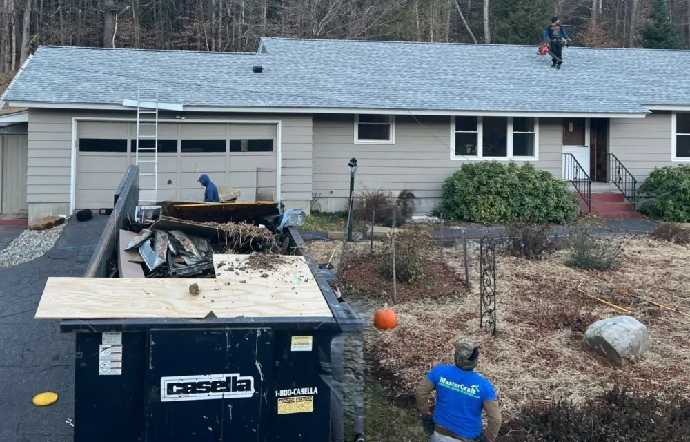 MasterCraft crew replacing an asphalt shingle roof with a dumpster in the driveway